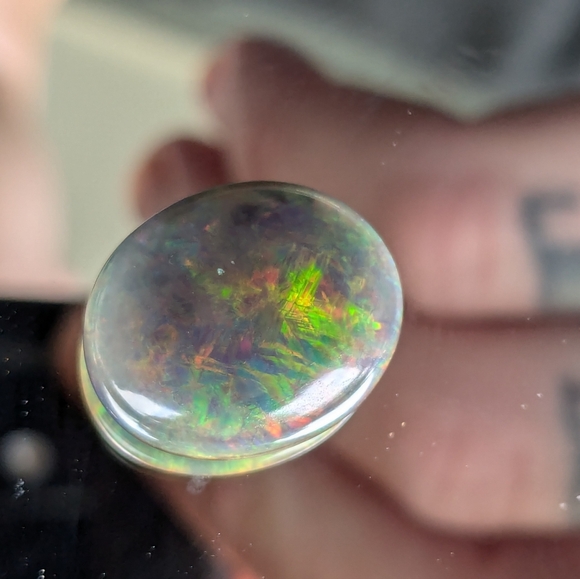5.85ct Natural play of color black opal - Picture 8 of 16